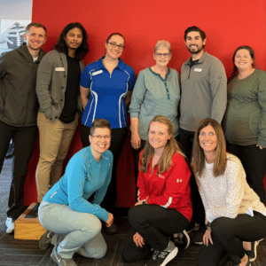 Bellevue clinic team with patient graduate